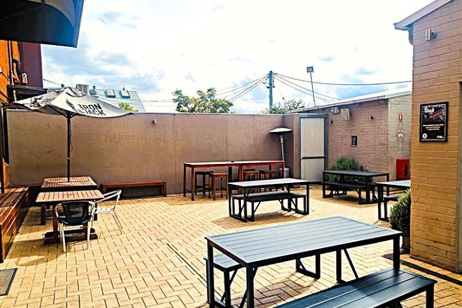 The paved beer garden and courtyard